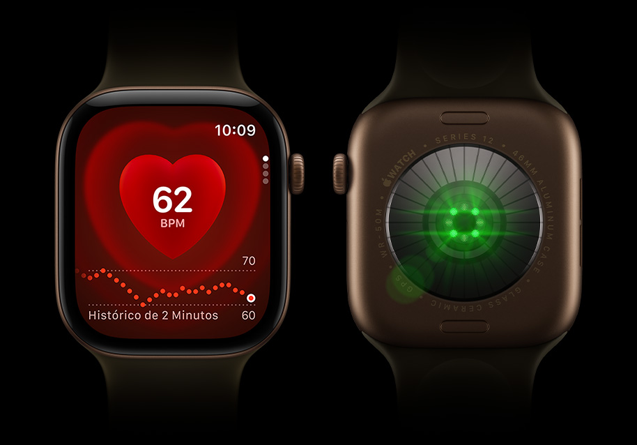 Dois relógios Apple Watch Series 12 lado a lado. À esquerda, a imagem da parte da frente do aparelho mostra a tela com o monitor de frequência cardíaca. À direita está a imagem da parte de trás com luzes brilhantes verdes