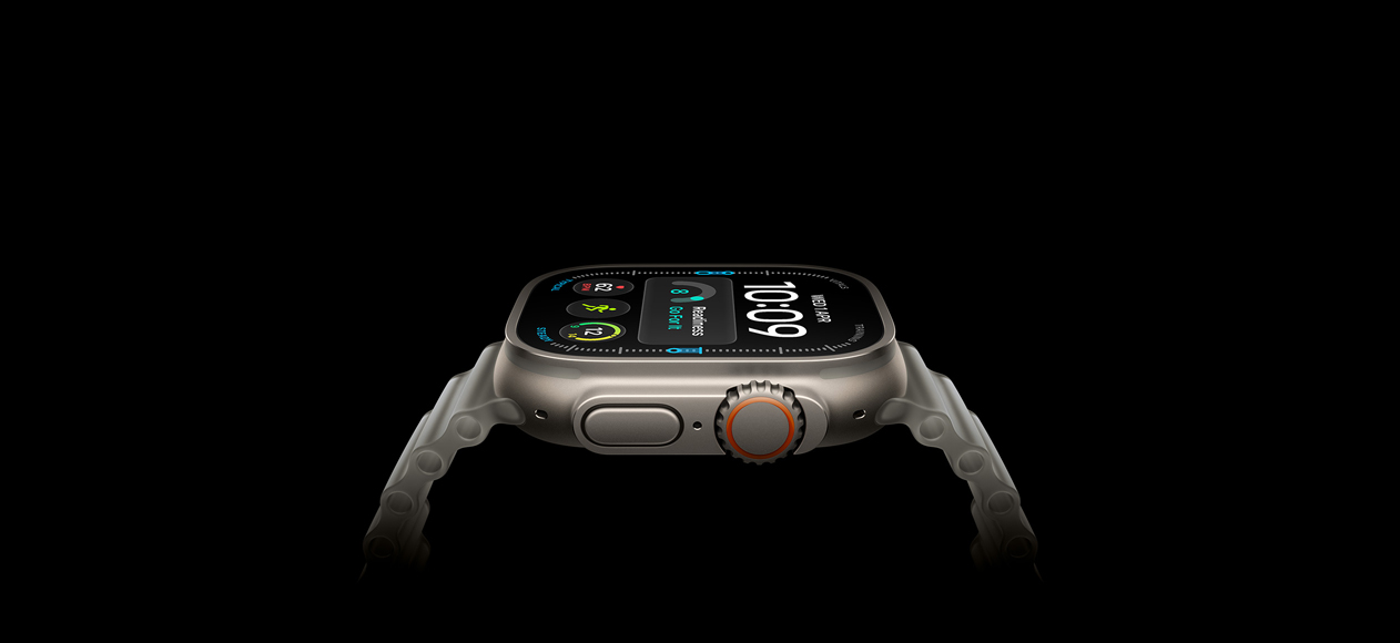 Apple Watch Ultra 4, titanium case, natural color, right exterior, Digital Crown, raised side button, digital watch face, translucent gray Ocean Band