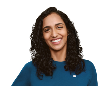 Apple Specialist smiling with an approachable demeanor