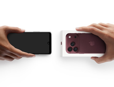 Hands exchanging phones, Android on the left without box, new iPhone 18 Pro, burgundy color (dark red), in box, on the right